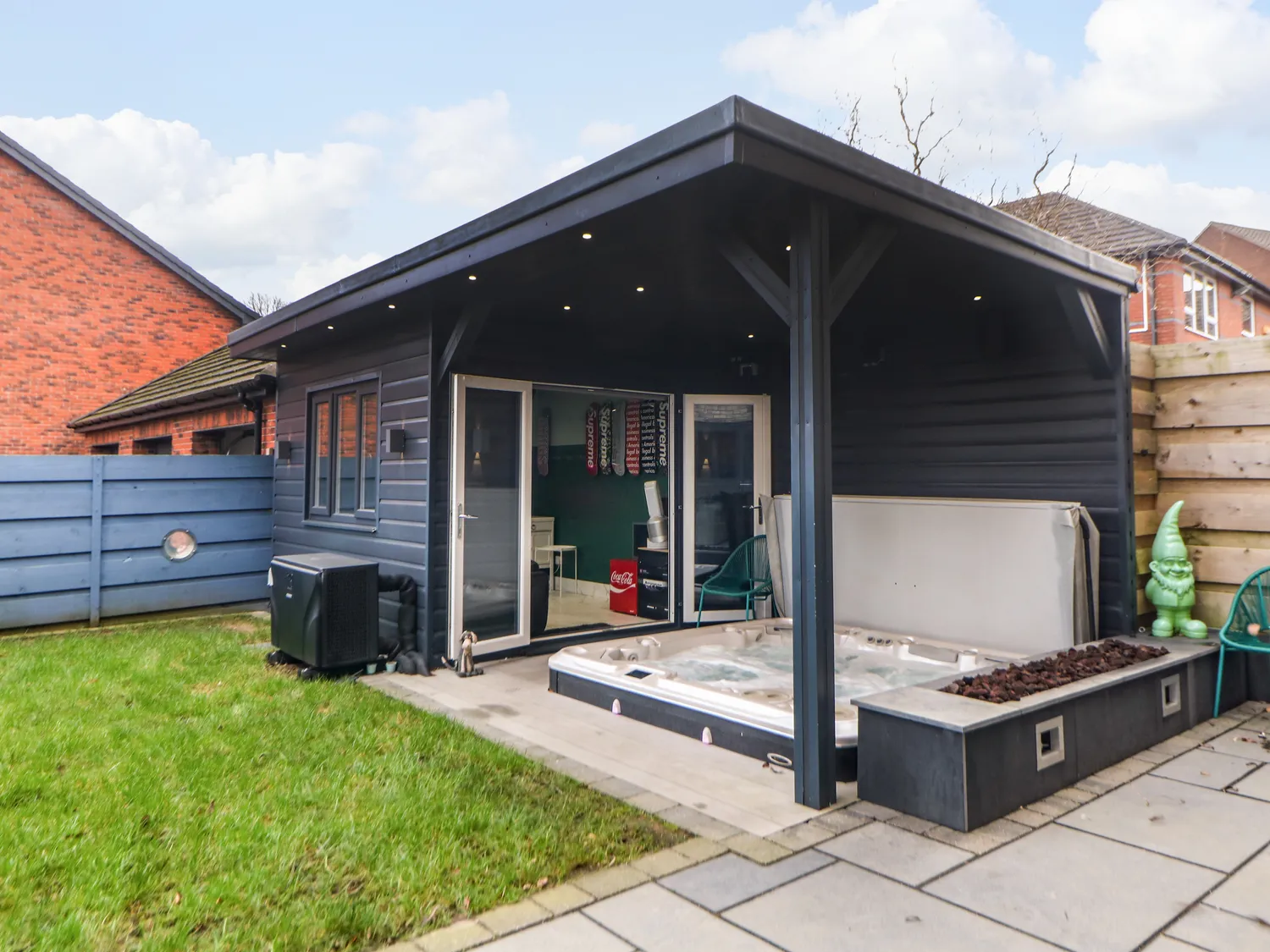 Covered summerhouse and hot tub at 4 Rockcliffe Grange